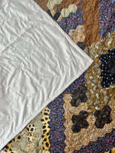 Load image into Gallery viewer, Tanzania Nights, A Finished Quilt