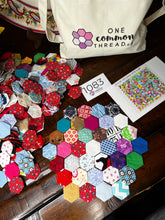 Load image into Gallery viewer, Showered with Love, 1&quot; hexagons 620 piece Comfort Quilt Kit